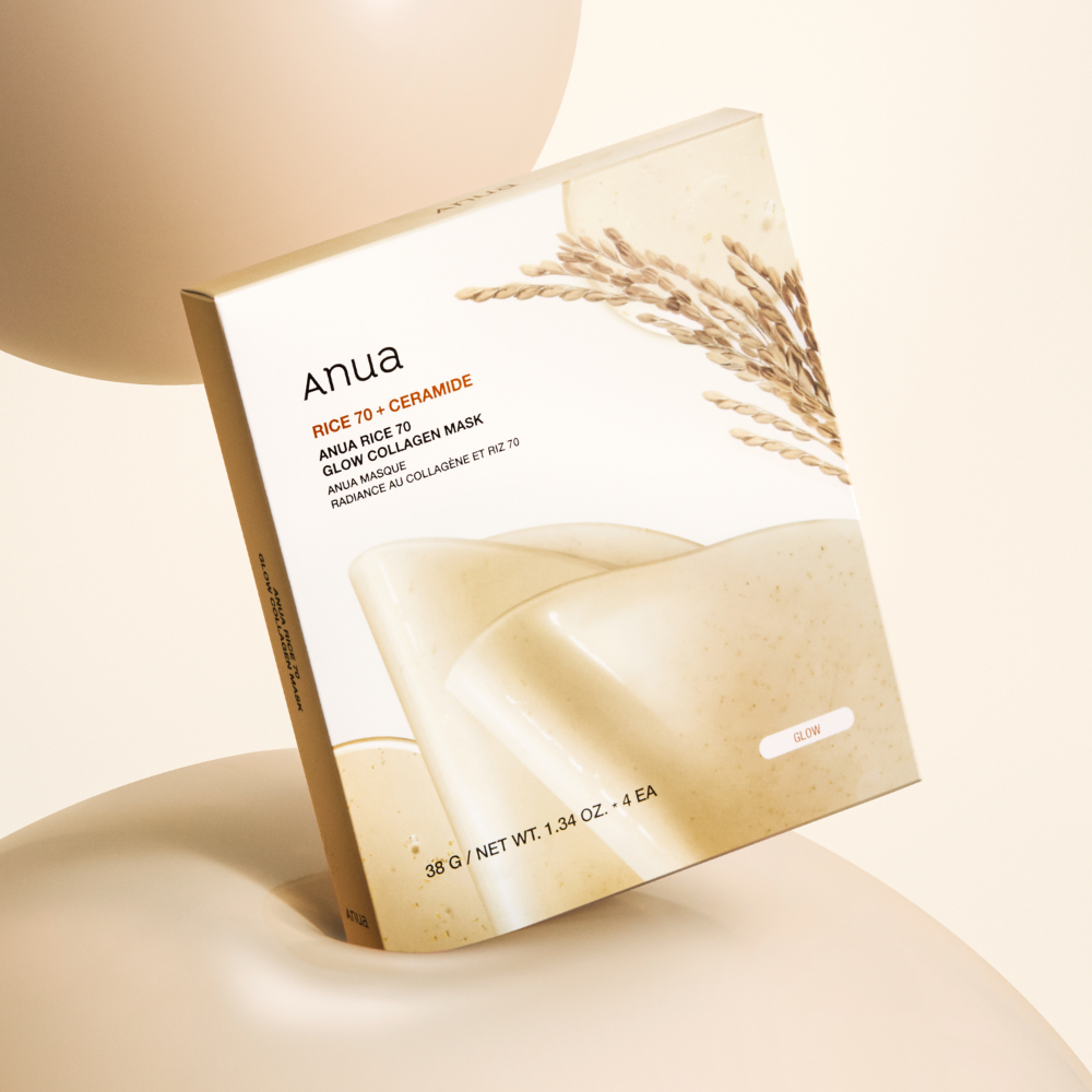 Anua Rice 70 Glow Collagen Mask sheet applied to face showing essence saturation